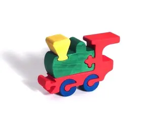 Fauna Dřevěné vkládací puzzle z masivu mašinka / od 3 let