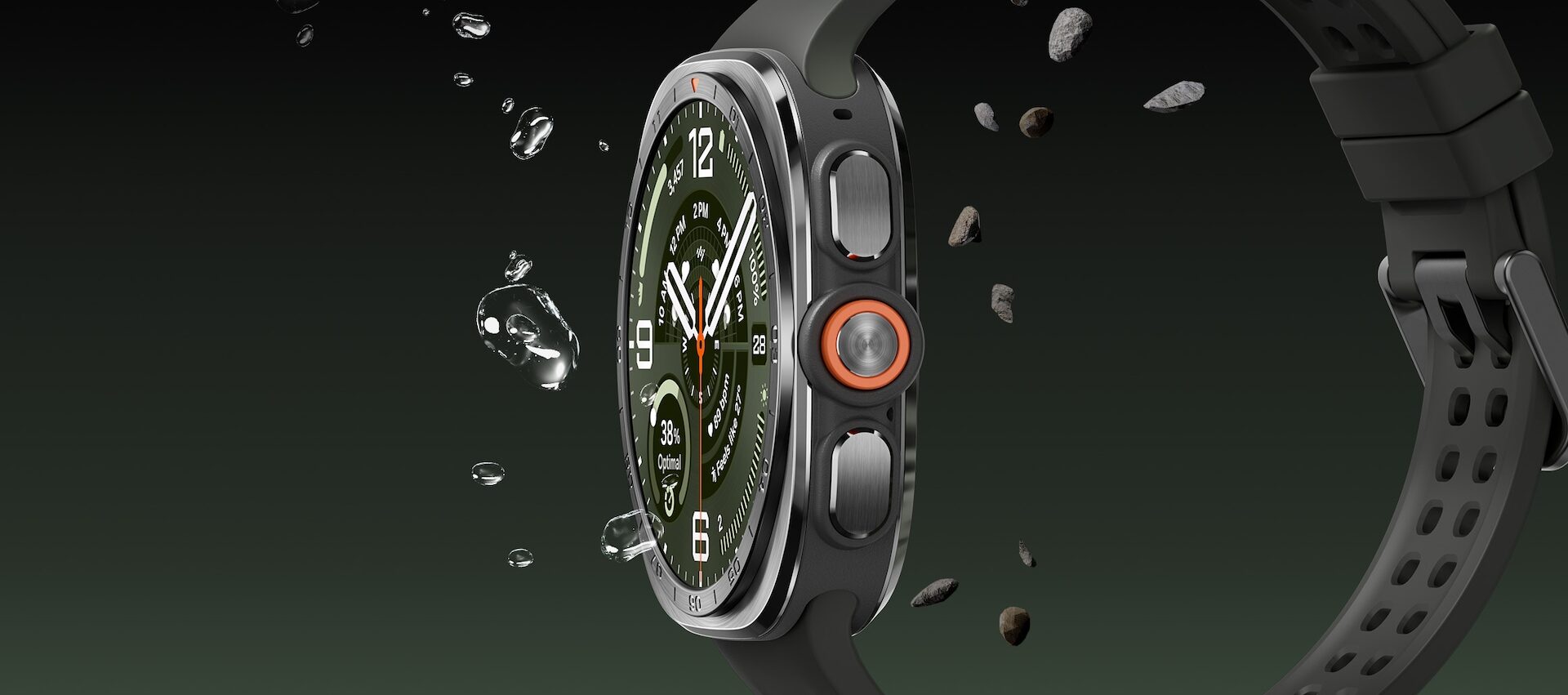 Galaxy Watch Ultra2 obklopené odletujícími úlomky a pískem